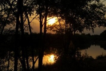 Maura Malpetti tramonto sul fiume